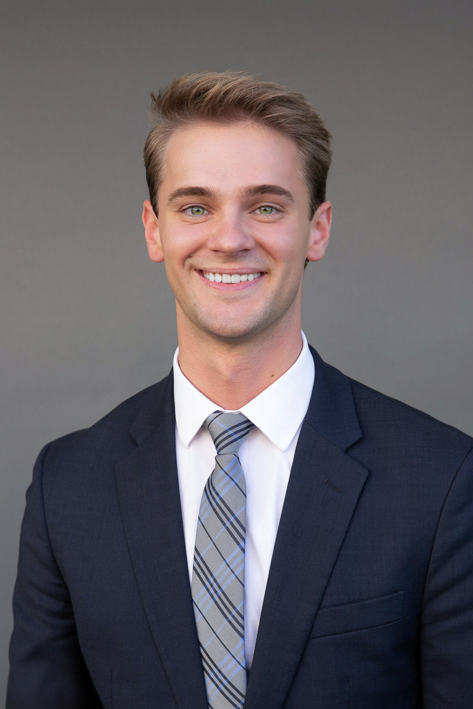 Professional headshot of Ethan Cook